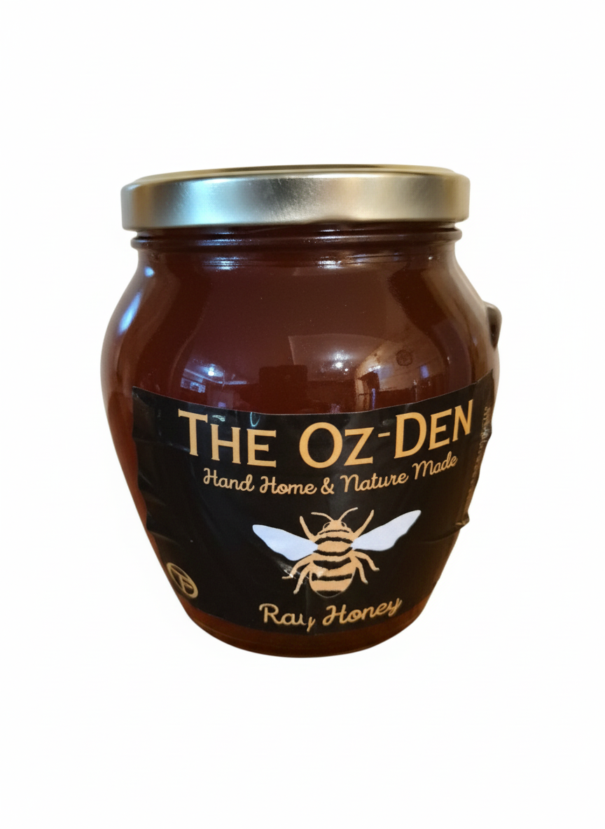 The Oz-Den 3lb Raw Honey jar with black label and silver lid